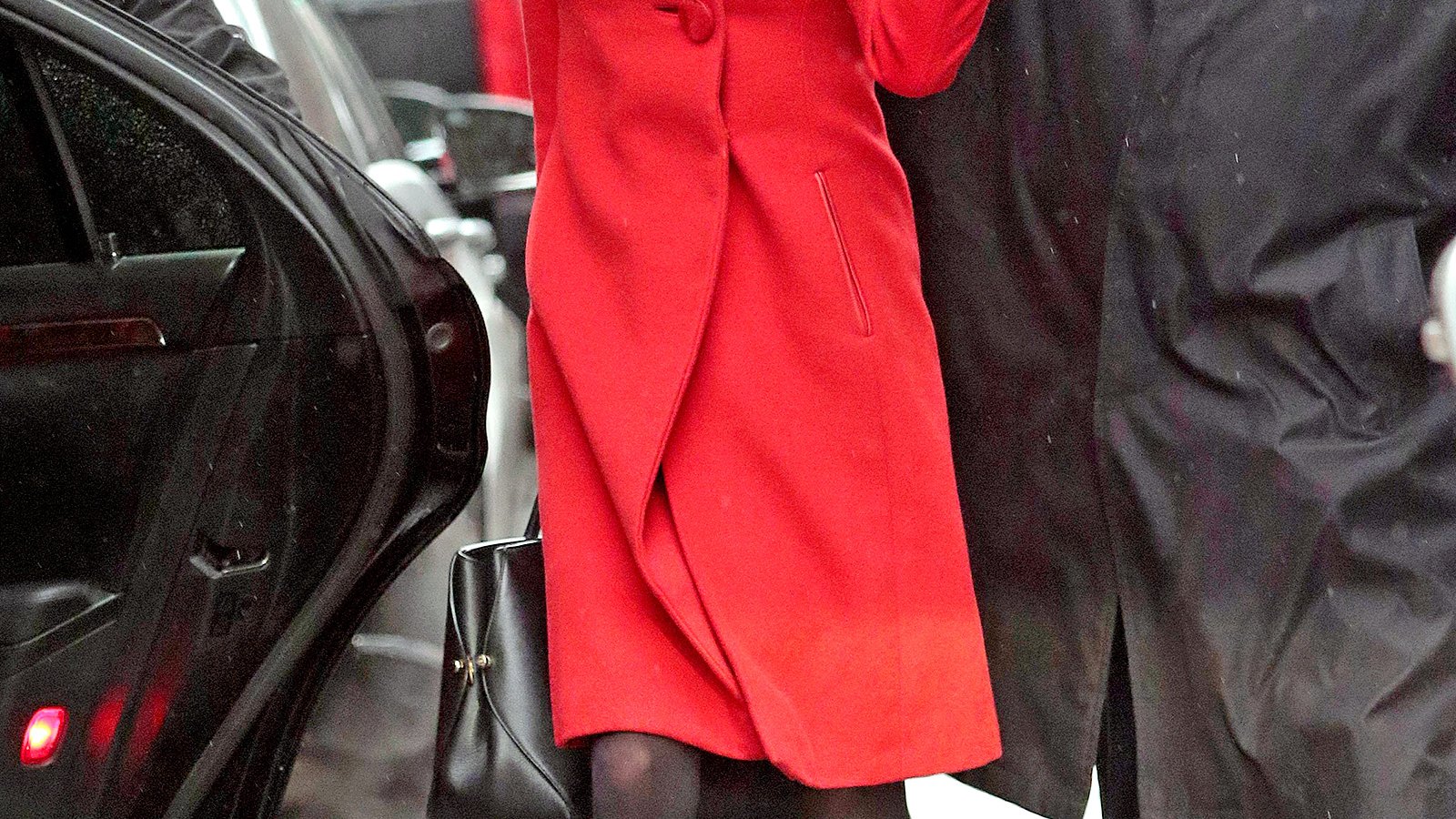 Amal Alamuddin in a red coat during a snow story in NYC on March 5.