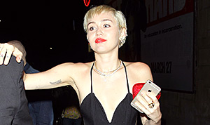 1426616044_miley cyrus jumpsuit 300