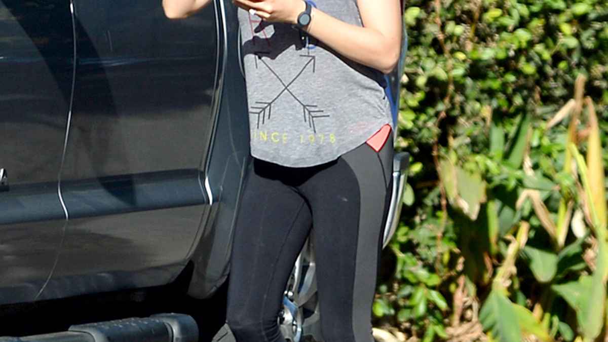 Mila Kunis wears workout attire on March 29, 2015.