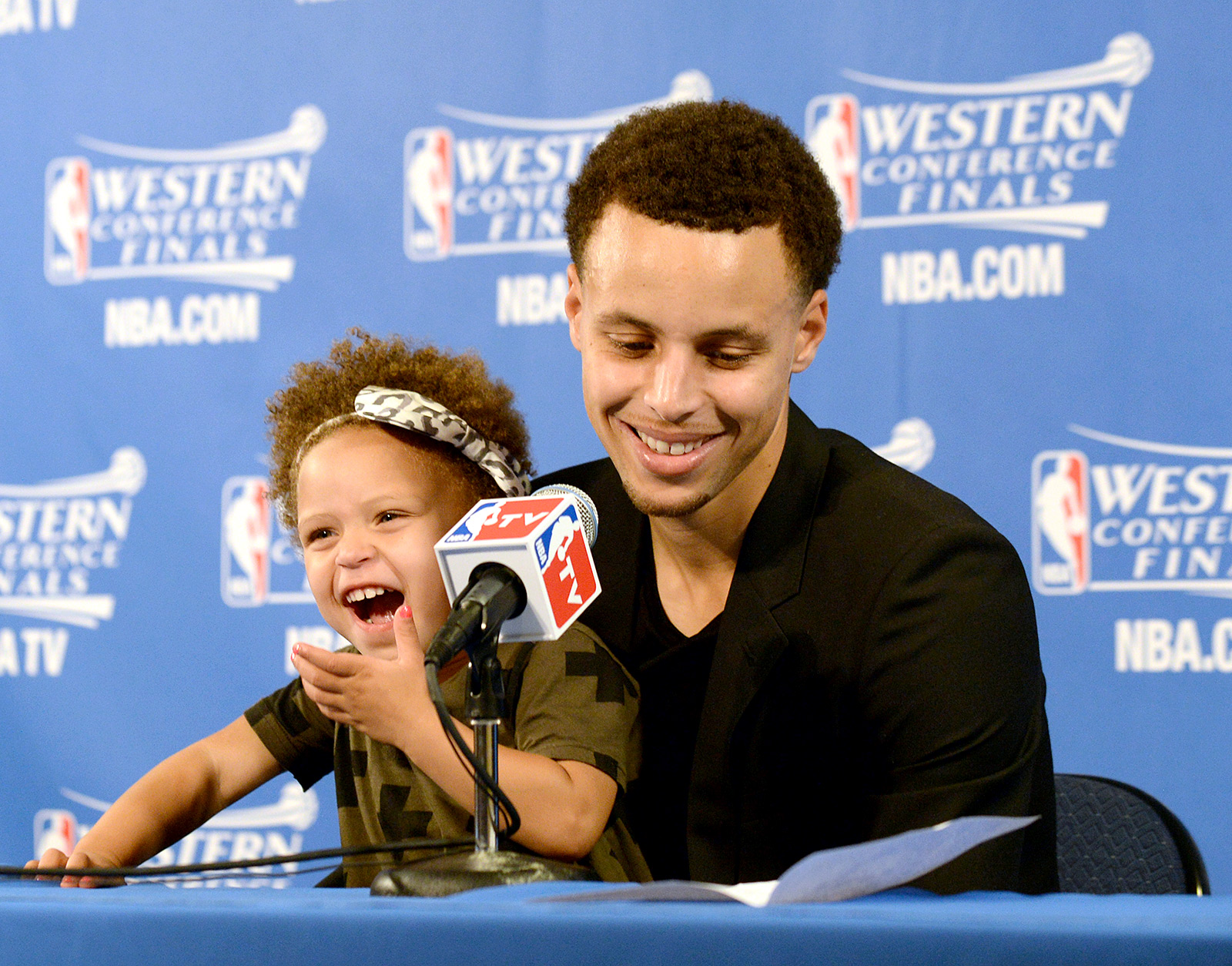 Stephen Curry Does Special Handshake with Daughter Riley, 10, at Game