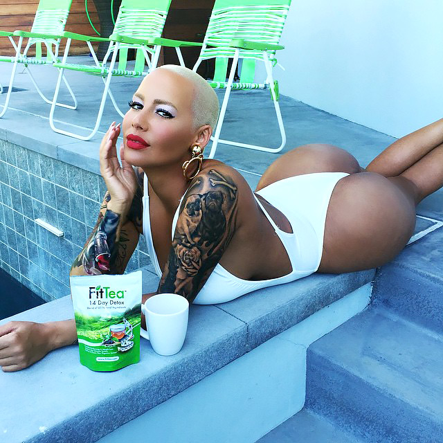 Amber Rose shows off her butt in a white swimsuit on Instagram.
