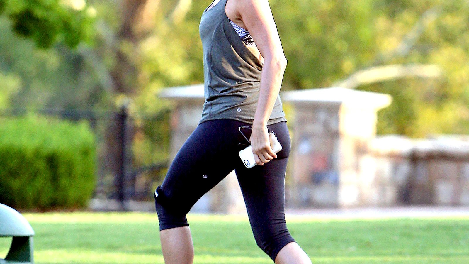 Jennifer Aniston smiles, wears workout clothes on set in Georgia.