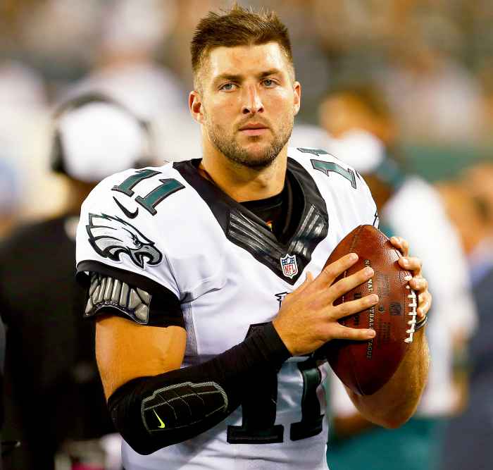 Tim Tebow #11 of the Philadelphia Eagles warms up on the sidelines against the New York Jets in the third quarter during a pre-season game at MetLife Stadium on September 3, 2015.