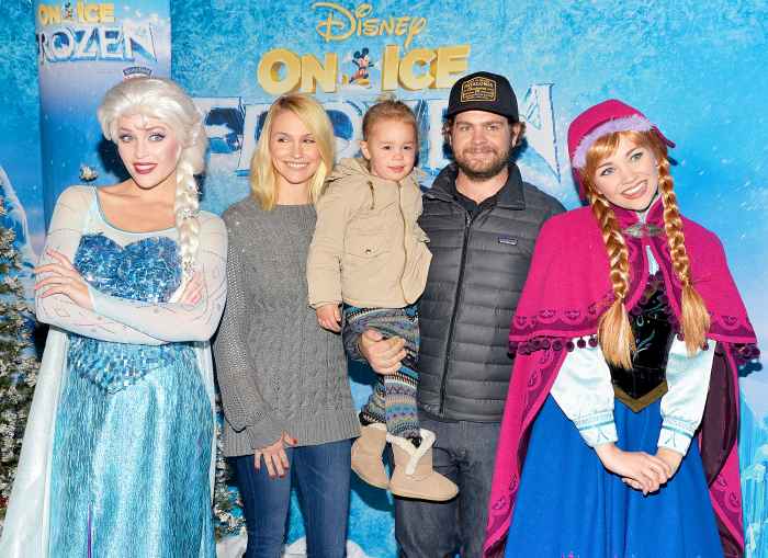 Jack Osbourne and wife Lisa with their daughter Pearl attend the premiere of Disney On Ice's "Frozen" at Staples Center on December 10, 2015 in Los Angeles, California.