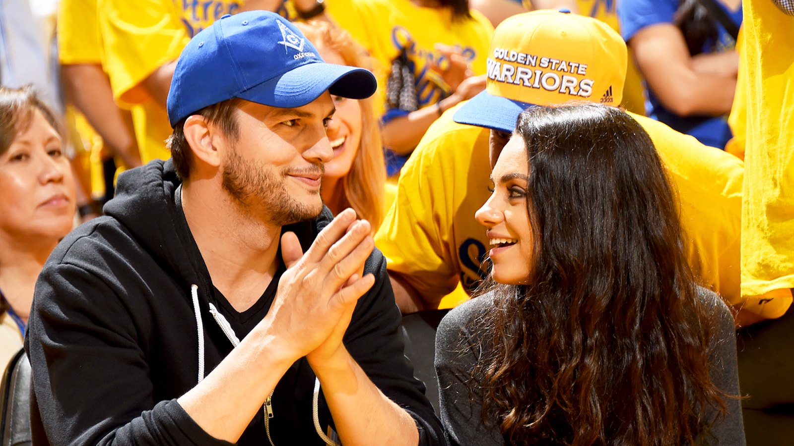 Ashton Kutcher and Mila Kunis attend Game Two of the 2016 NBA Finals at ORACLE Arena in Oakland, California.