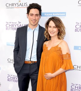 Ben and Michelle showing off baby bump