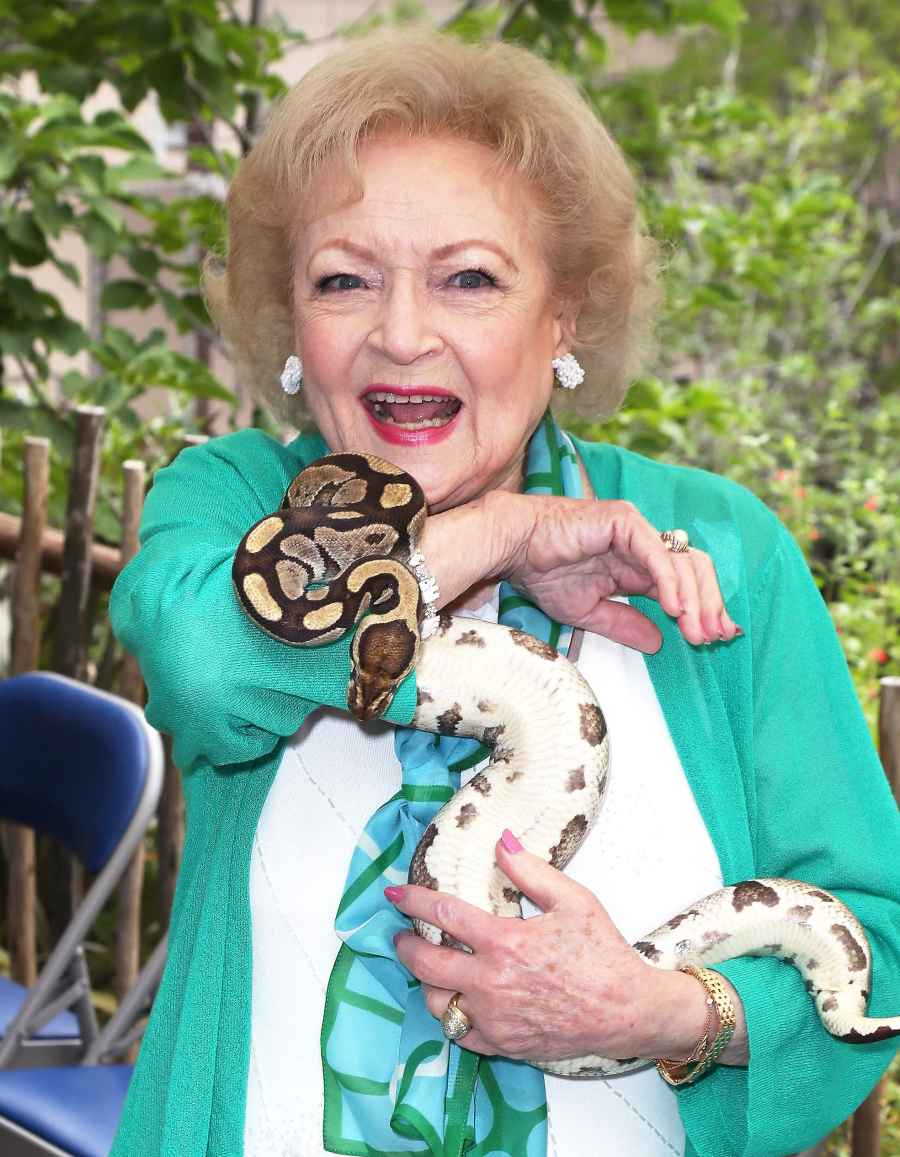 Betty White holds a snake 2013