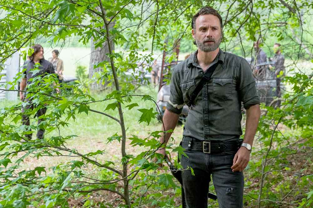 Andrew Lincoln as Rick Grimes and Norman Reedus as Daryl Dixon on The Walking Dead.