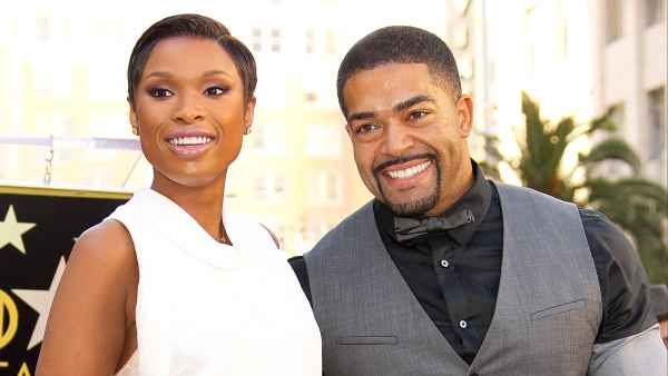 Jennifer Hudson and David Otunga with their son David Daniel Otunga Jr. as she is honored with a Star on The Hollywood Walk of Fame on November 13, 2013 in Hollywood, California.