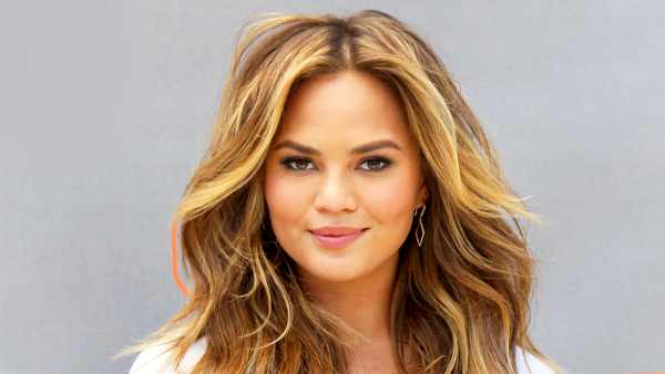 Chrissy Teigen visits "Extra" at Universal Studios Hollywood in Universal City, California.