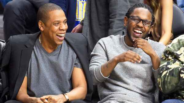 Jay Z and Kendrick Lamar attend a basketball game between the Golden State Warriors and the Los Angeles Clippers at Staples Center on February 20, 2016 in Los Angeles, California.