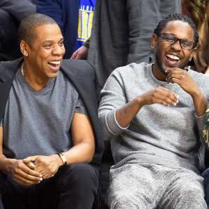 Jay Z and Kendrick Lamar attend a basketball game between the Golden State Warriors and the Los Angeles Clippers at Staples Center on February 20, 2016 in Los Angeles, California.