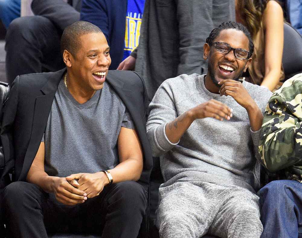 Jay Z and Kendrick Lamar attend a basketball game between the Golden State Warriors and the Los Angeles Clippers at Staples Center on February 20, 2016 in Los Angeles, California.