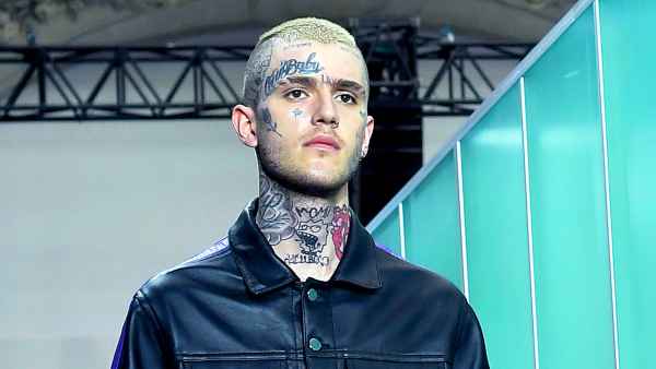 Lil Peep walks the runway during the Vlone Menswear Spring/Summer 2018 show as part of Paris Fashion Week on June 23, 2017 in Paris, France.