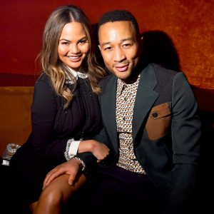 Chrissy Teigen and John Legend attends the Miu Miu aftershow during the Paris Fashion Week at Boum Boum in Paris, France.