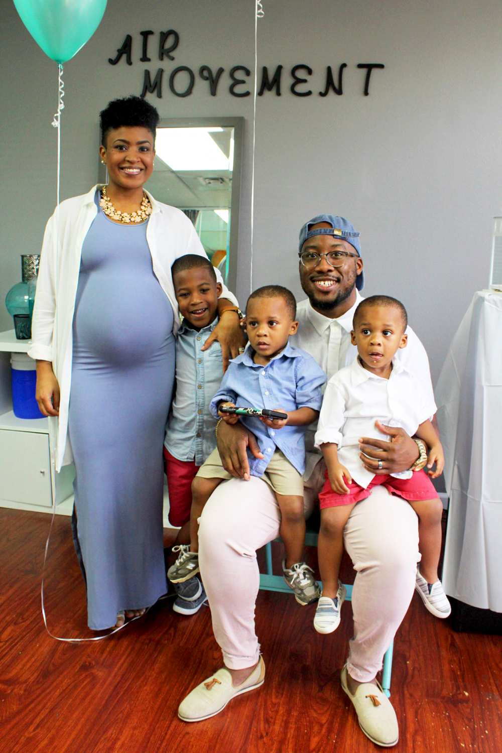 Nia and Robert Tolbert with their sons Shai and twins Alexander and Riley