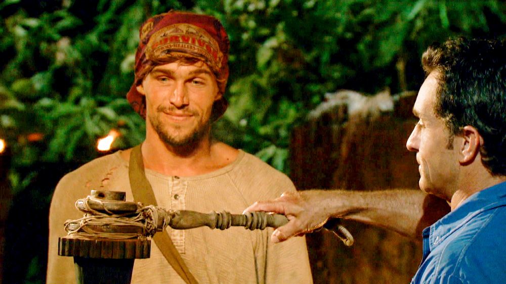 Jeff Probst extinguishes Cole Medders' torch at Tribal Council on Survivor themed ‘Heroes vs. Healers vs. Hustlers‘