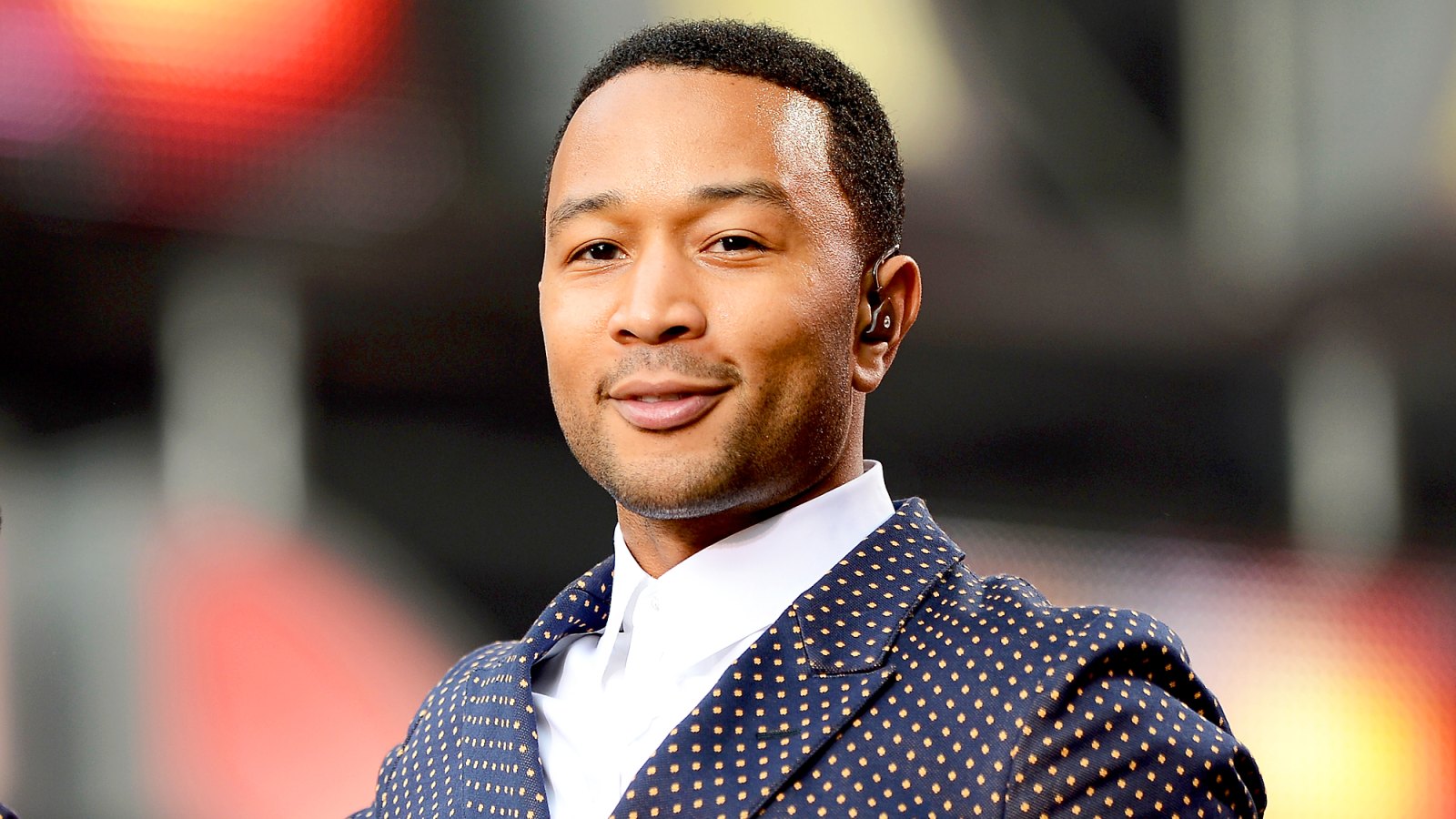 John Legend performs on stage at the "Chime For Change: The Sound Of Change Live" Concert at Twickenham Stadium in London, England.