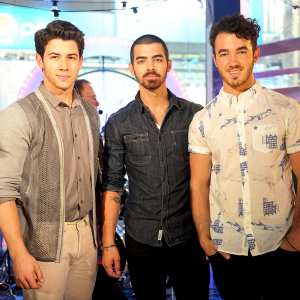 Nick Jonas, Joe Jonas and Kevin Jonas perform during the MTV, VH1, CMT & LOGO 2013 O Music Awards in New York City.