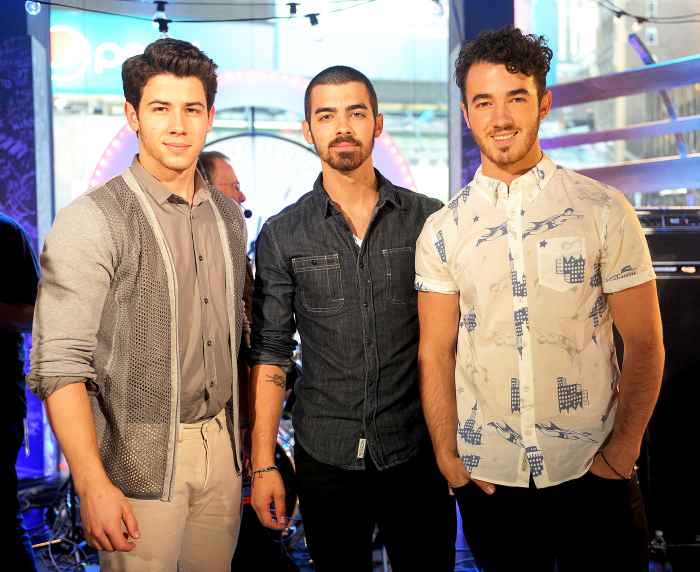 Nick Jonas, Joe Jonas and Kevin Jonas perform during the MTV, VH1, CMT & LOGO 2013 O Music Awards in New York City.