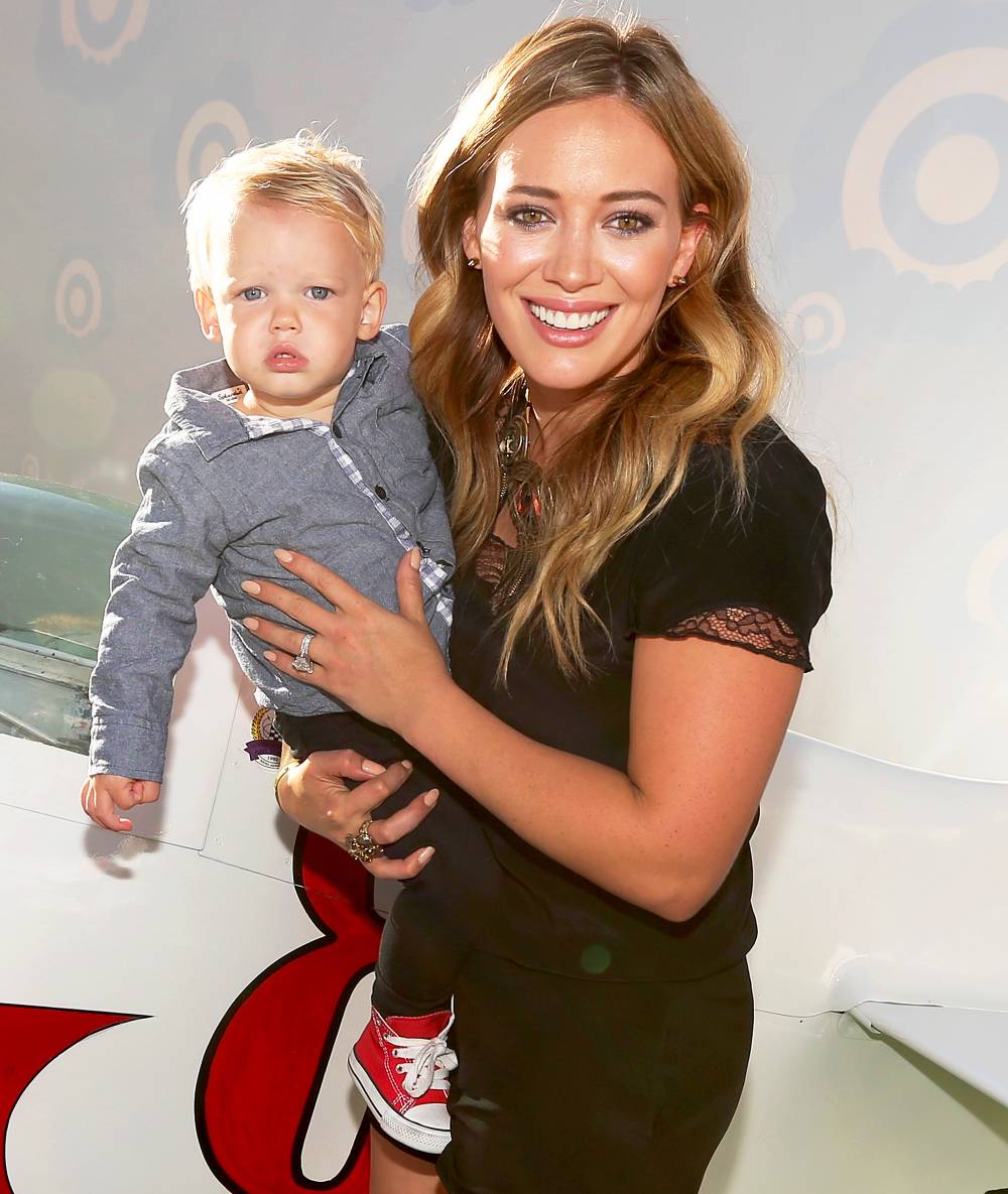 Hilary Duff and her son Luca explore the Target Landing Zone at the world premiere of “Disney's Planes” at the El Capitan Theatre on August 5, 2013 in Hollywood, California.