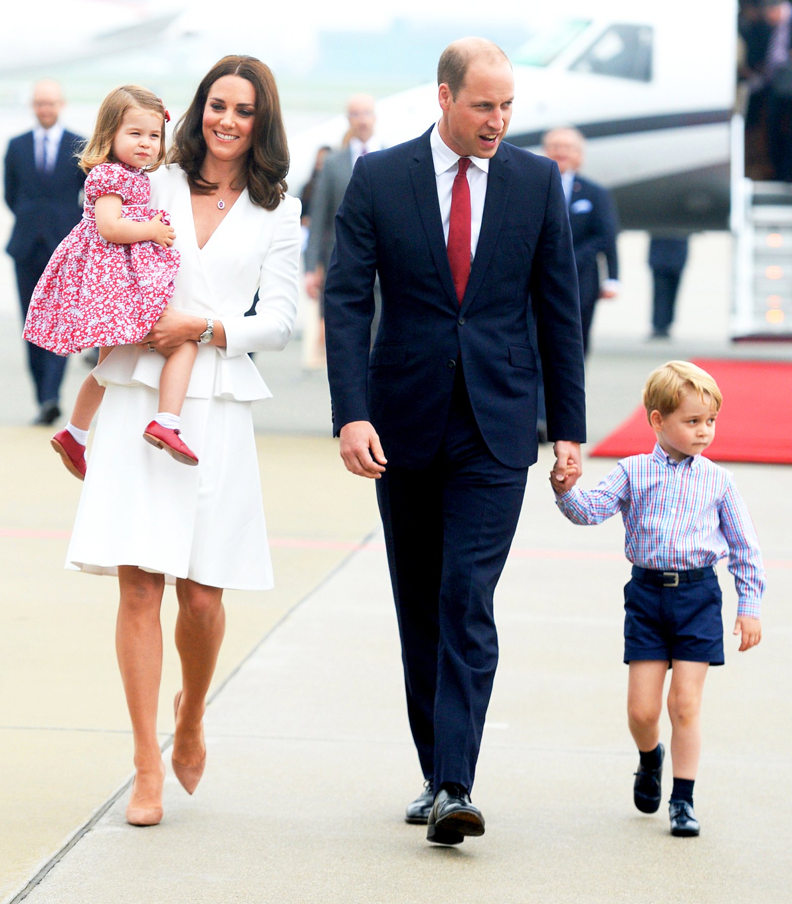 Catherine, Duchess of Cambridge, Princess Charlotte of Cambridge, Prince William, Duke of Cambridge and Prince George of Cambridge arrive at Warsaw airport on July 17, 2017 in Warsaw, Poland.