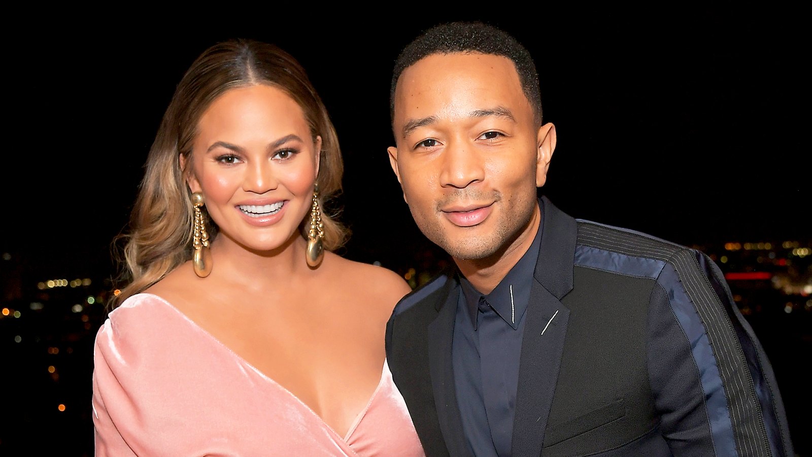 Chrissy Teigen and John Legend attend GQ and Dior Homme private dinner in celebration of The 2017 GQ Men Of The Year Party at Chateau Marmont on December 7, 2017 in Los Angeles, California.