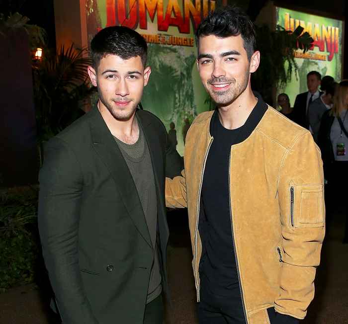Nick Jonas and Joe Jonas attend the premiere of Columbia Pictures' "Jumanji: Welcome To The Jungle" on December 11, 2017 in Hollywood, California.