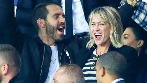 Clement Giraudet and Robin Wright attends the UEFA Champions League group B match at Parc des Princes on September 27, 2017 in Paris, France.