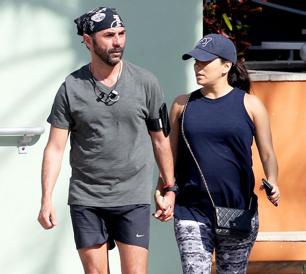 Pregnant Eva Longoria takes a walk with her husband Jose Baston on Christmas Day in Miami Beach, Florida on December 25, 2017.