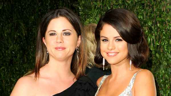 Mandy Teefey and Selena Gomez arrive at the 2012 Vanity Fair Oscar Party hosted by Graydon Carter at Sunset Tower in West Hollywood, California.