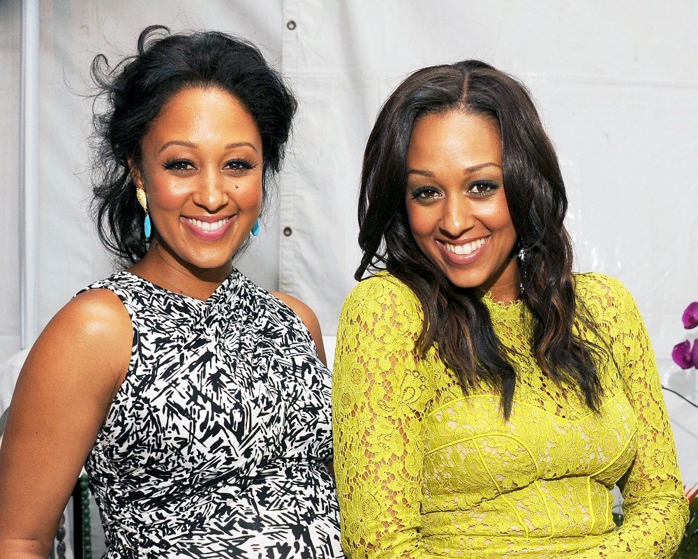 Tamera Mowry and Tia Mowry attend Teen Choice at Gibson Amphitheatre in Universal City, California.