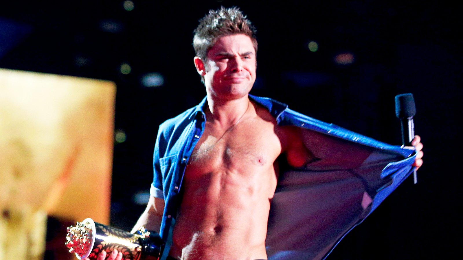 Zac Efron onstage at the 2014 MTV Movie Awards at Nokia Theatre L.A. Live in Los Angeles, California.