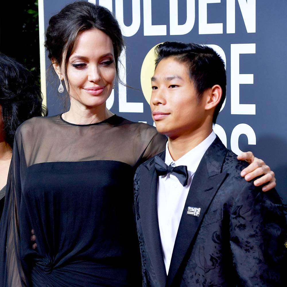 Angelina Jolie and Pax attend The 75th Annual Golden Globe Awards at The Beverly Hilton Hotel on January 7, 2018 in Beverly Hills, California.