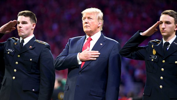 Donald Trump during the National Anthem at the the College Football Playoff National Championship in Atlanta, Georgia on January 8, 2018.