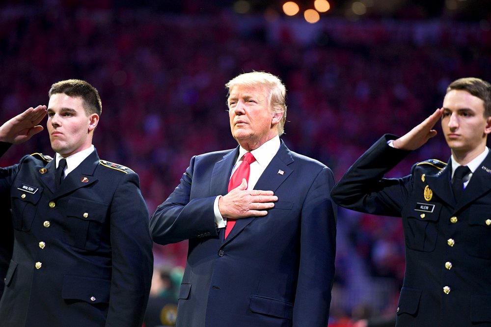 Donald Trump during the National Anthem at the the College Football Playoff National Championship in Atlanta, Georgia on January 8, 2018.