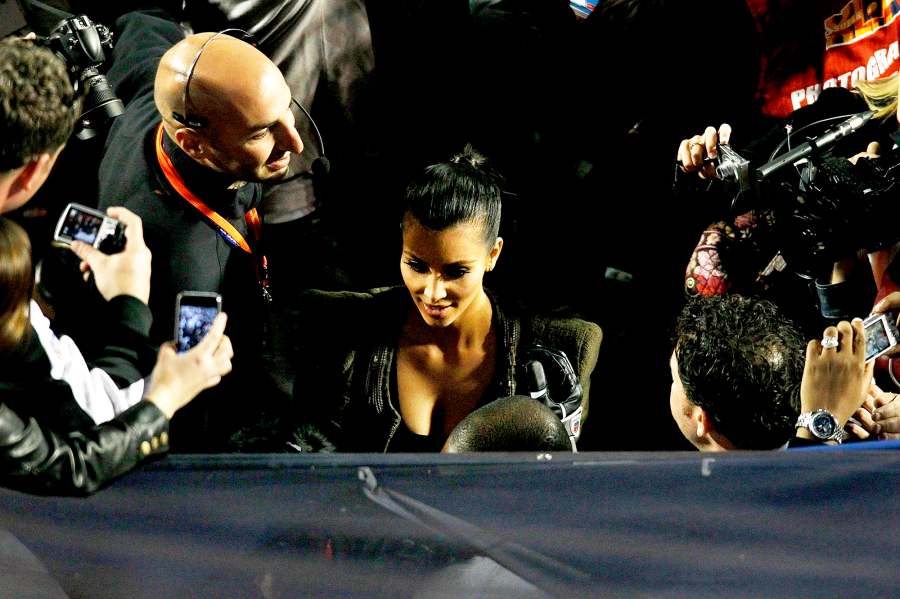 Kim Kardashian leaves the field after Super Bowl XLIV between the Indianapolis Colts and the New Orleans Saints on February 7, 2010 at Sun Life Stadium in Miami Gardens, Florida.