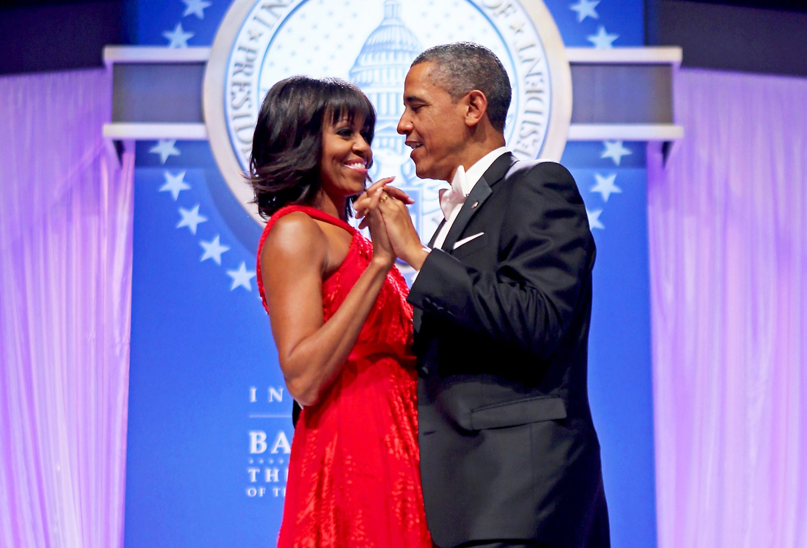 Michelle Obama and Barack Obama dance together during the Inaugural Ball at the Walter Washington Convention Center in Washington, D.C.