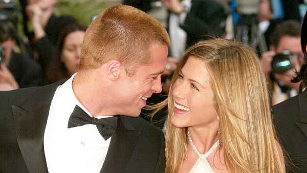 Brad Pitt and Jennifer Aniston attend the 2004 Premiere of the epic movie "Troy" at Le Palais de Festival in Cannes, France.