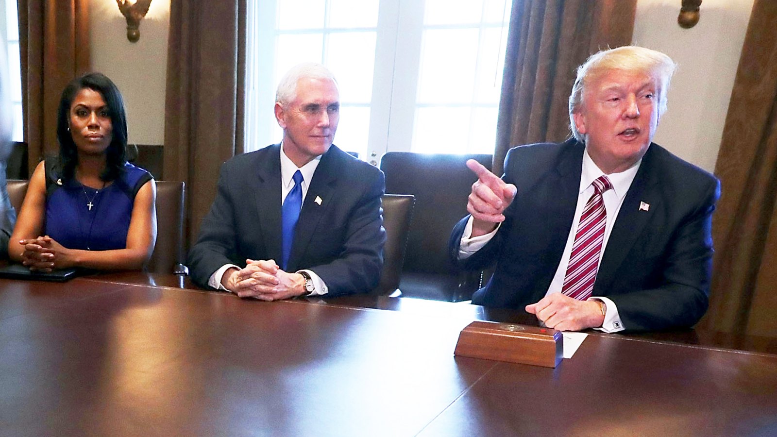 Omarosa Manigault, Mike Pence and Donald Trump during a meeting with the Congressional Black Caucus Executive Committee in the Cabinet Room at the White House March 22, 2017 in Washington, DC.