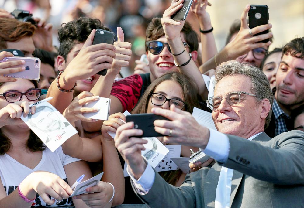 Bryan Cranston takes a selfie with the fans during the Giffoni Film Festival 2017 photocall in Giffoni Valle Piana, Italy.