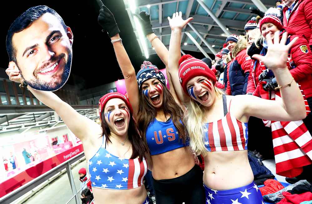 Fans of Chris Mazdzer of the United States including his girlfriend Mara Marian and sisters Kate and Sara Mazdzer react following his third run during the Luge Men's Singles on day two of the PyeongChang 2018 Winter Olympic Games on February 11, 2018 in South Korea.