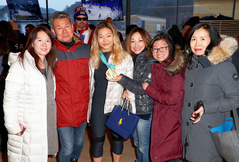 U.S. Olympian Chloe Kim poses with her family at the USA House at the PyeongChang 2018 Winter Olympic Games on February 14, 2018 in Pyeongchang-gun, South Korea.