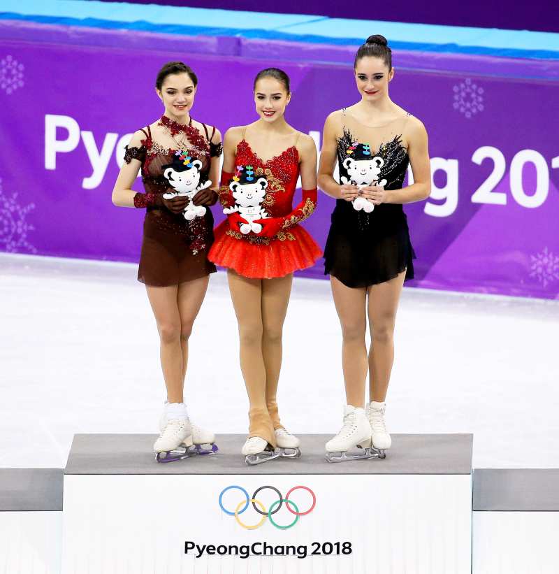 Silver medalist Evgenia Medvedeva of Olympic Athlete from Russia, gold medalist Alina Zagitova of Olympic Athlete from Russia, bronze medalist Kaetlyn Osmond of Canada during the venue victory ceremony following the Figure Skating Ladies Free program on day fourteen of the PyeongChang 2018 Winter Olympic Games at Gangneung Ice Arena on February 23, 2018 in Gangneung, South Korea.
