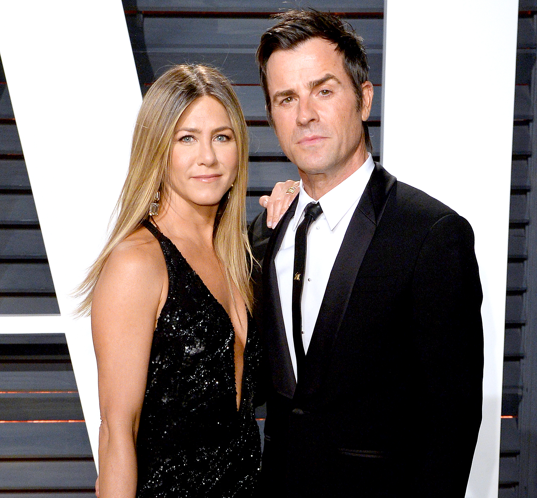 Justin Theroux and Jennifer Aniston attending the Louis Vuitton's