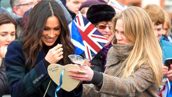 Meghan Markle accompanied by Amy Pickerill