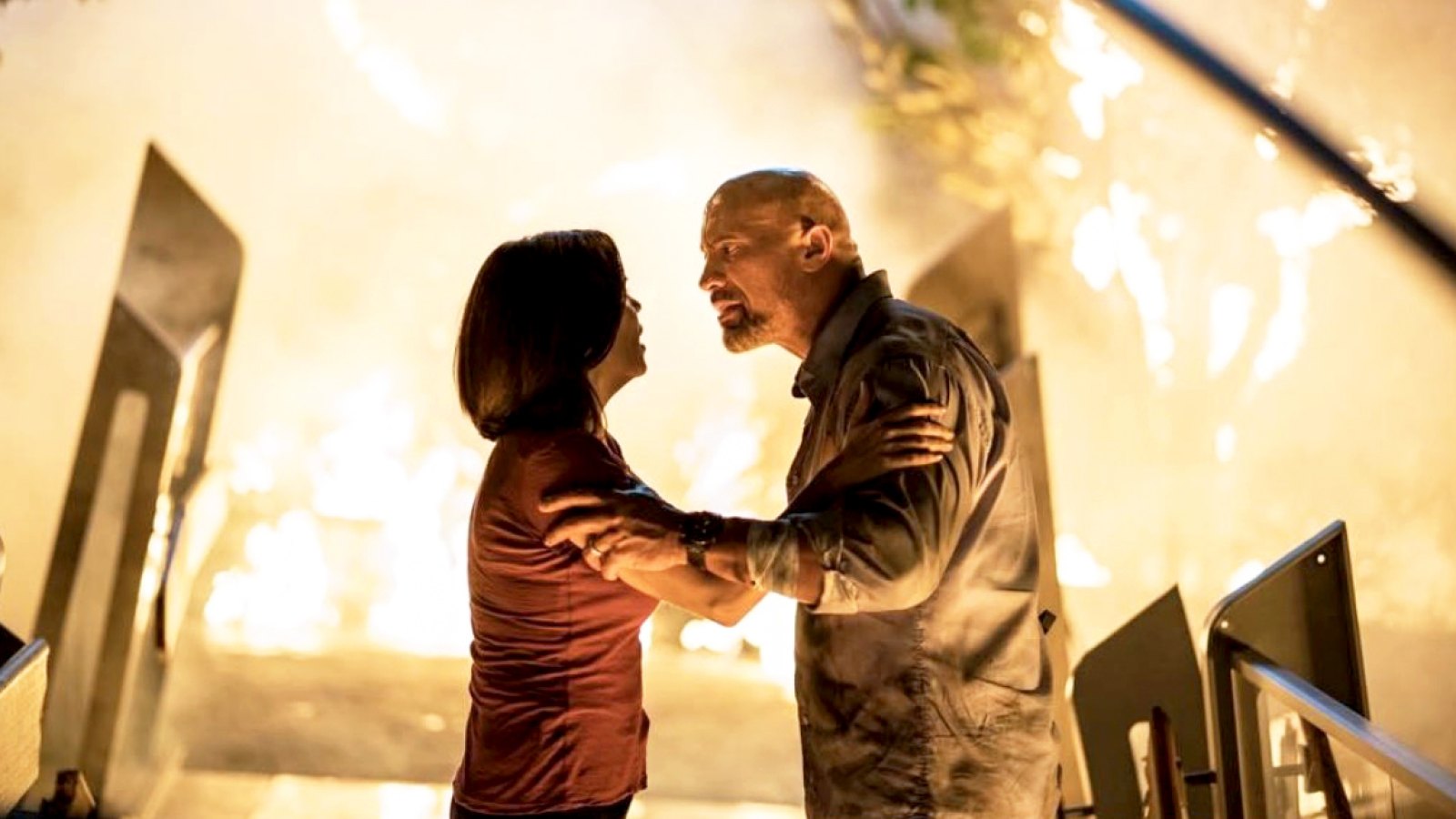 Neve Campbell and Dwayne Johnson in ‘Skyscraper‘
