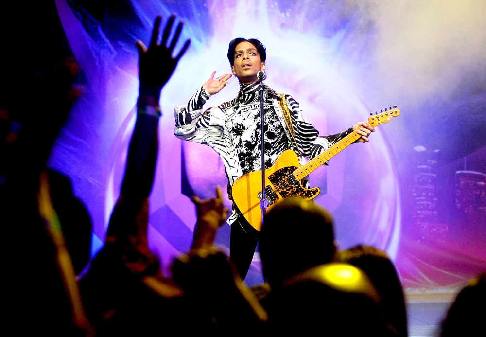 Prince performs on stage during 'One Night... Three Venues' at Nokia Theatre L.A. Live in Los Angeles in 2009.