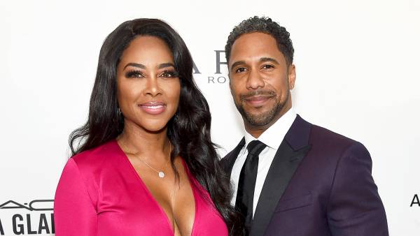 Kenya Moore and Marc Daly attend the 26th annual Elton John AIDS Foundation's Academy Awards Viewing Party at The City of West Hollywood Park in Hollywood, California.
