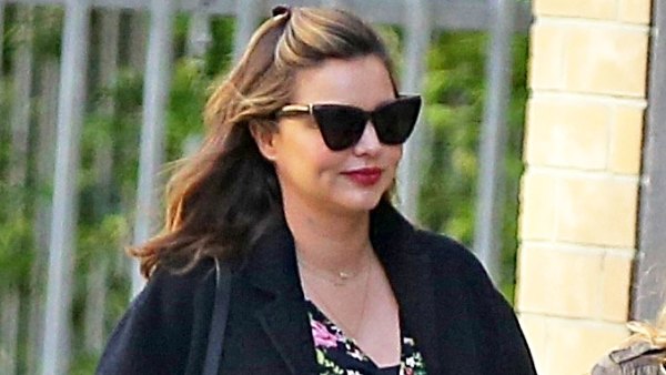Pregnant Miranda Kerr Shows Off Baby Bump in Floral Dress on March 25, 2018.